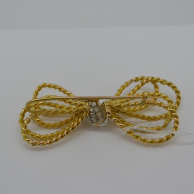 Broche style noeud et Diamants