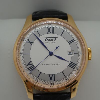 Montre TISSOT en or jaune automatic