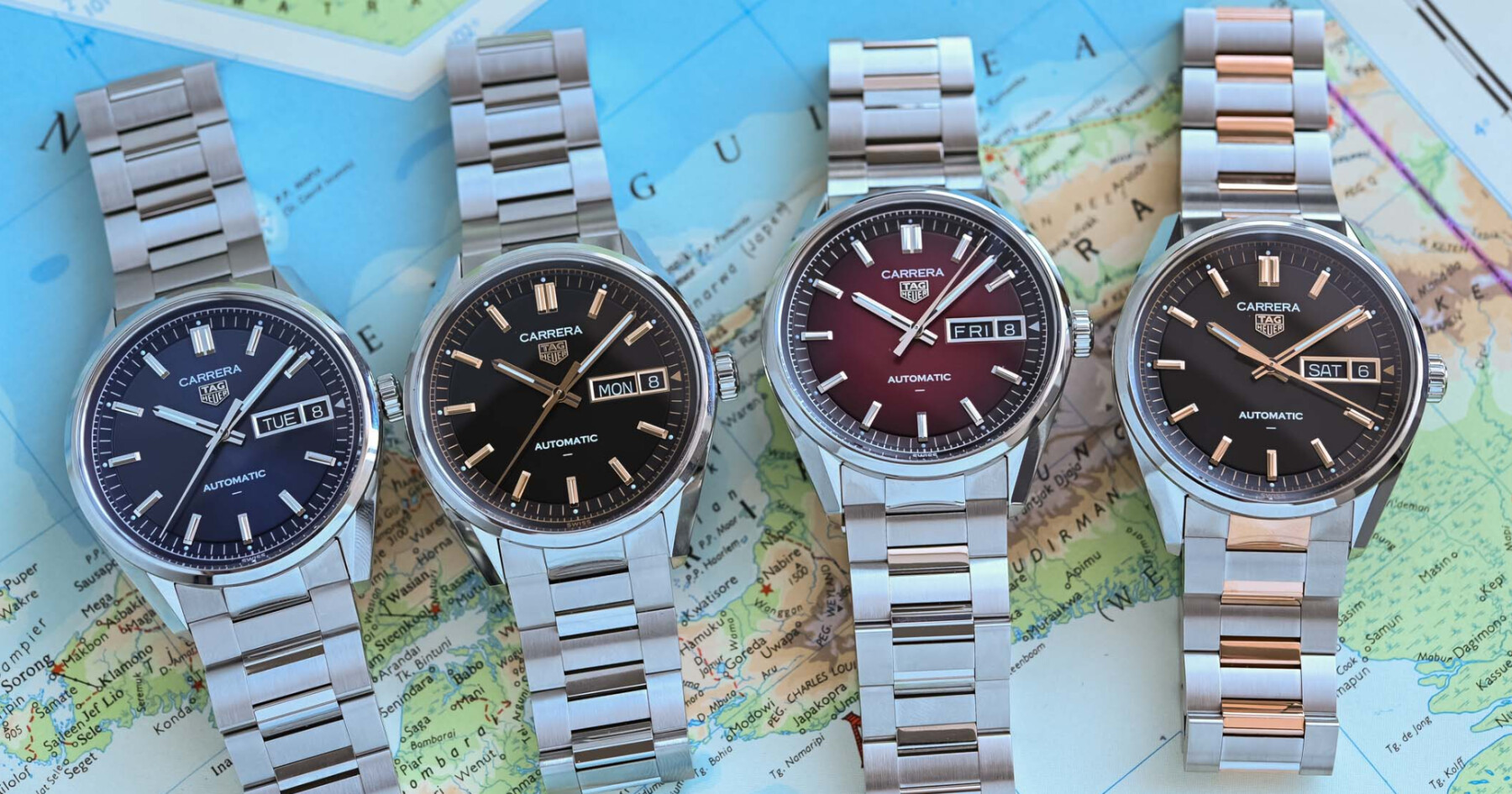 Quatre montres TAG Heuer Carrera Day Date vues de face sur une carte