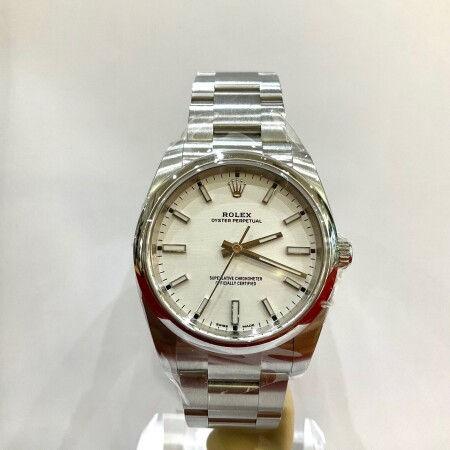 Montre Rolex Oyster perpetual cadran blanc 114200