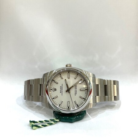 Montre Rolex Oyster perpetual cadran blanc 114200