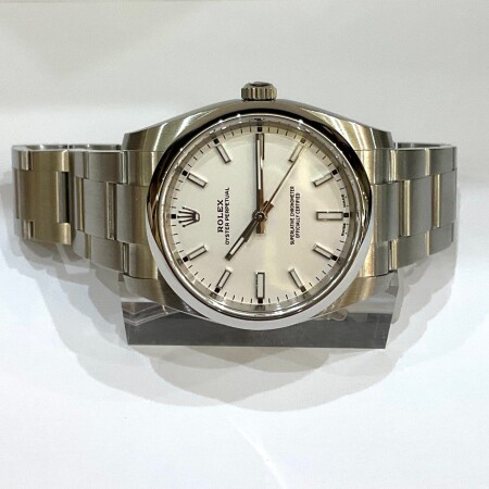 Montre Rolex Oyster perpetual cadran blanc 114200