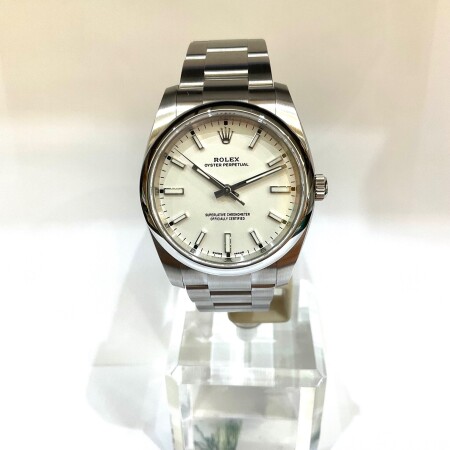 Montre Rolex Oyster perpetual cadran blanc 114200