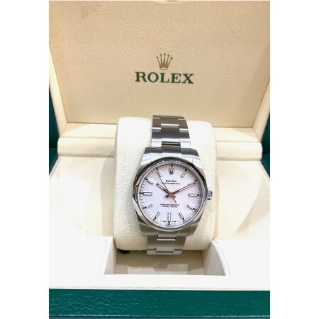 Montre Rolex Oyster perpetual cadran blanc 114200