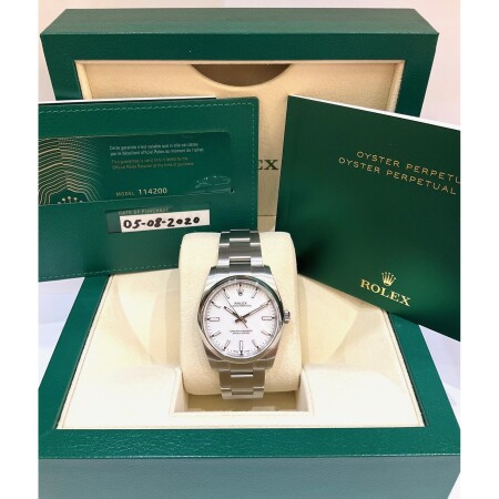 Montre Rolex Oyster perpetual cadran blanc 114200