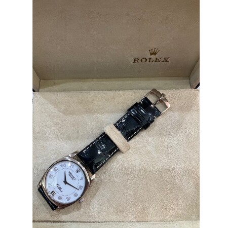 Montre Rolex cellini Danaos 4233/9 or gris