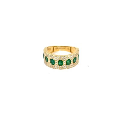 Bague or jaune "nid d' abeille " émeraude et diamant.