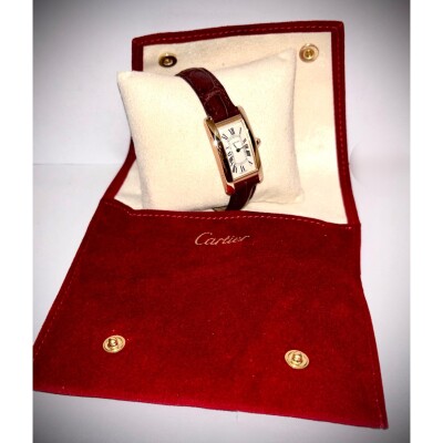 Montre Tank Américaine Petit modèle, mouvement quartz, or rose, cuir OCCASION