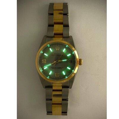 Rolex oyster or jaune er acier 14203M de 2007