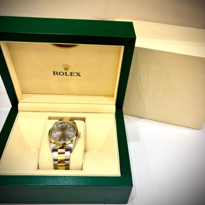 Rolex oyster or jaune er acier 14203M de 2007