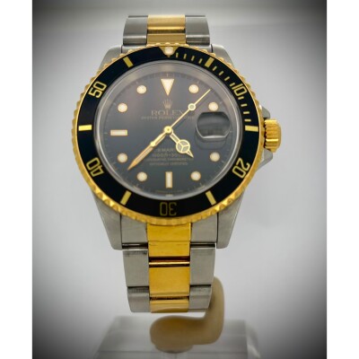 Montre Rolex Submariner Date acier or jaune