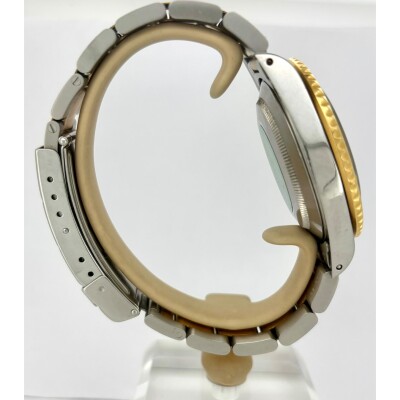 Montre Rolex Submariner Date acier or jaune