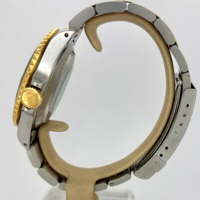 Montre Rolex Submariner Date acier or jaune