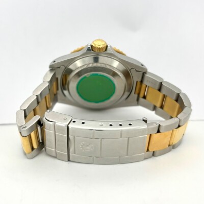Montre Rolex Submariner Date acier or jaune