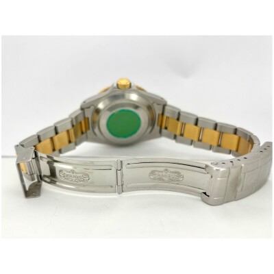 Montre Rolex Submariner Date acier or jaune