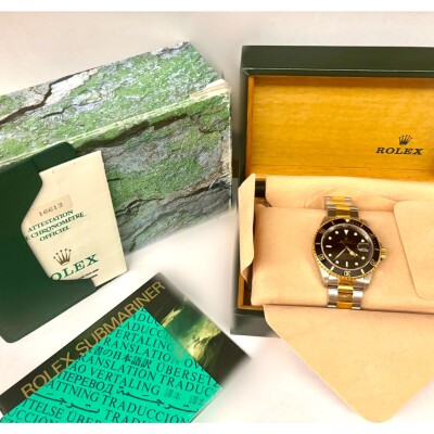 Montre Rolex Submariner Date acier or jaune