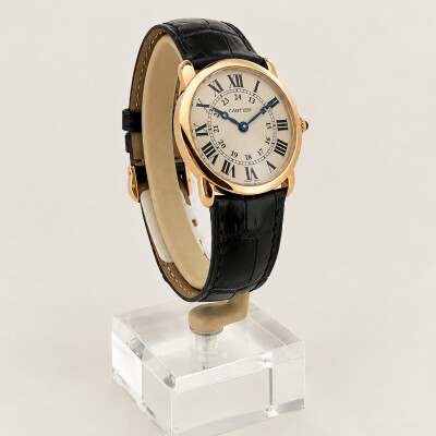 Montre Ronde Louis Cartier 29mm, mouvement quartz, or rose, cuir