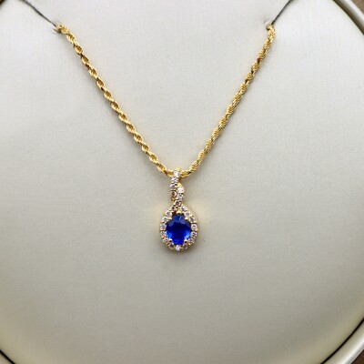 Pendentif or jaune, saphir et diamants