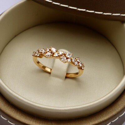 Bague 1/2 tour or rose, diamants poire et brillant