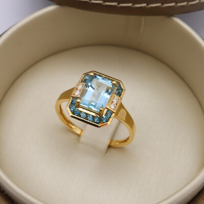 Bague or jaune, topaze bleue et diamants