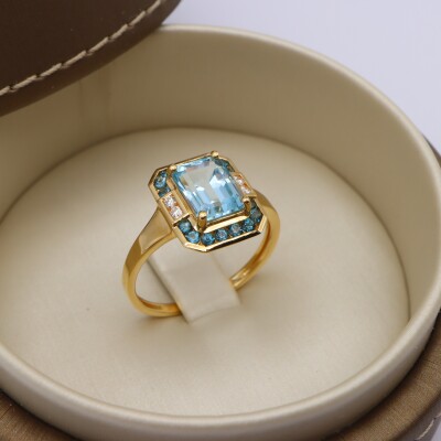 Bague or jaune, topaze bleue et diamants