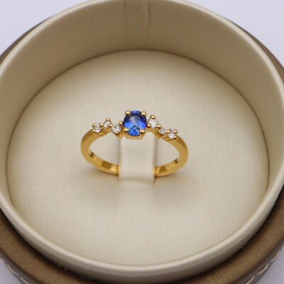 Bague or jaune, saphir bleu et diamant