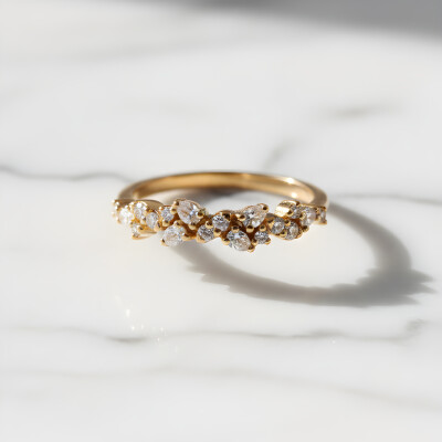 Bague 1/2 tour or rose, diamants poire et brillant