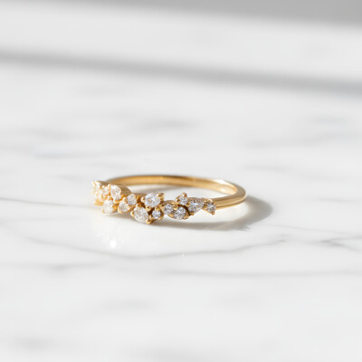 Bague 1/2 tour or rose, diamants poire et brillant