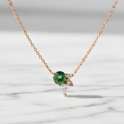 Collier or rose saphir vert et diamant