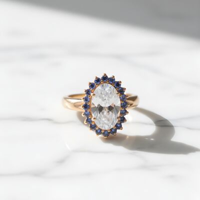 Bague or rose, aigue marine et entourage saphirs