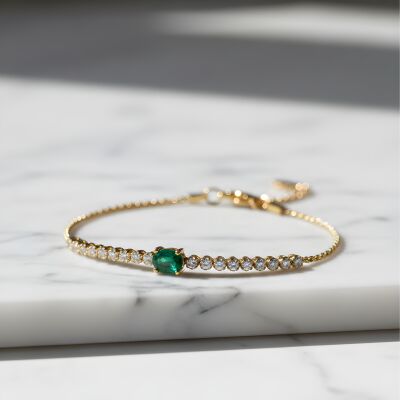 Bracelet or jaune émeraude et diamants