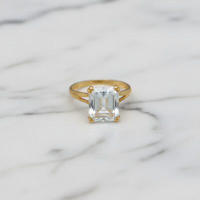 Bague or jaune et aigue marine taille rectangle