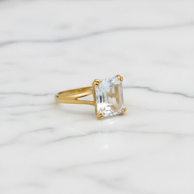 Bague or jaune et aigue marine taille rectangle