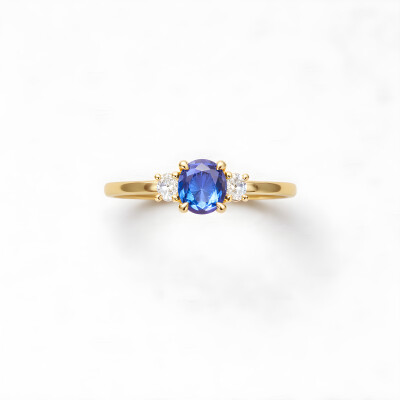 Bague or jaune, saphir et diamants