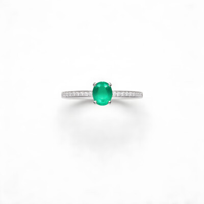 Bague or blanc, émeraude et diamants