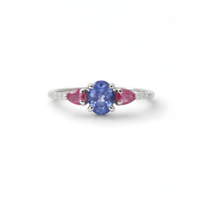 Bague or blanc, tanzanite et saphirs rose