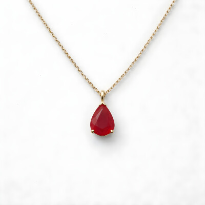 Collier or jaune avec pendentif rubis