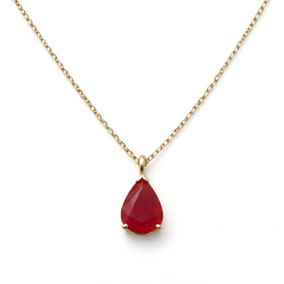 Collier or jaune avec pendentif rubis