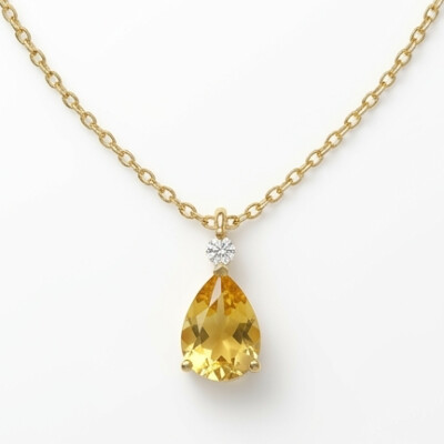 Collier or jaune saphir jaune taille poire et diamant