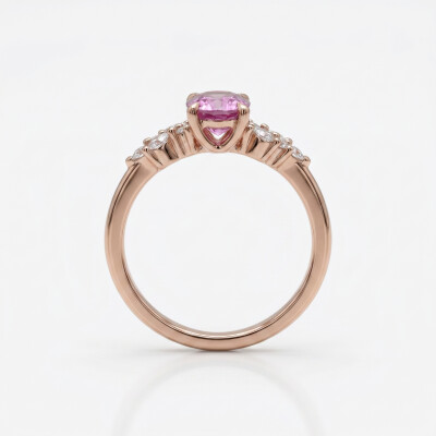 Bague or rose, saphir rose et diamants