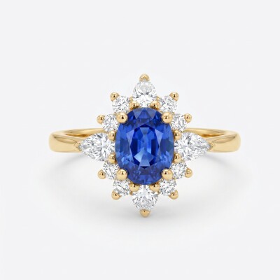 Bague or jaune, saphir et entourage diamants