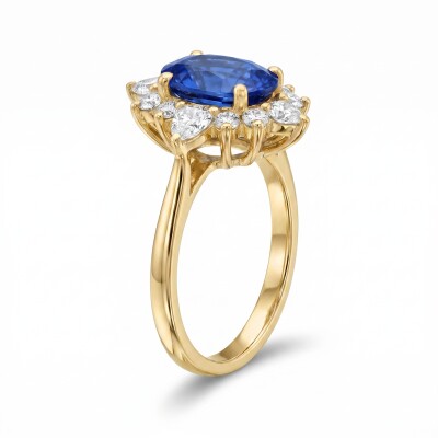 Bague or jaune, saphir et entourage diamants