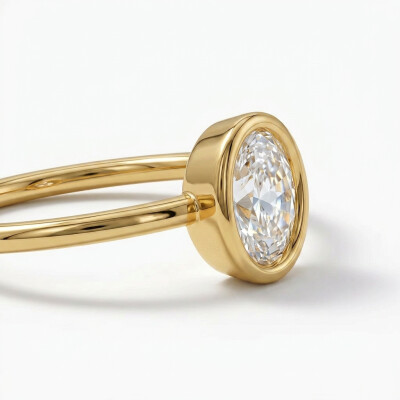 Solitaire or jaune et diamant serti clos