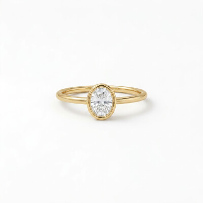 Solitaire or jaune et diamant serti clos