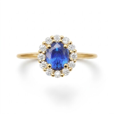 Bague or jaune, saphir entourage diamants