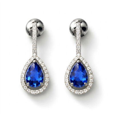Pendants or blanc, saphirs bleus et diamants