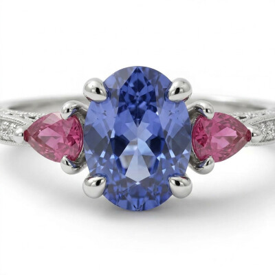 Bague or blanc, tanzanite et saphirs rose