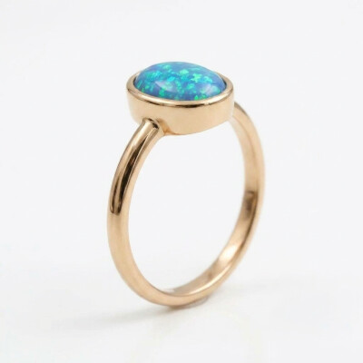 Bague or rose doublet opale noire