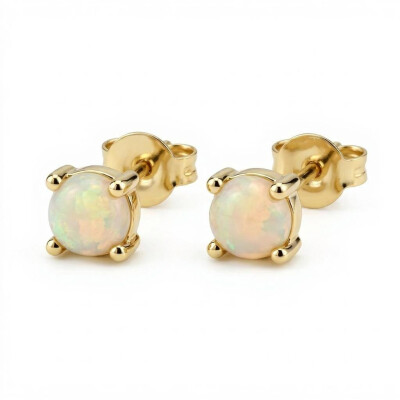 Boucles d'oreilles or jaune opale et griffes
