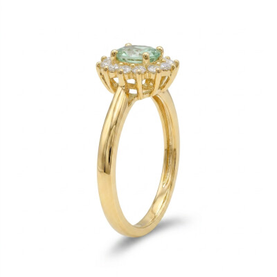 Bague saphir vert taille ovale et diamants taille brillant